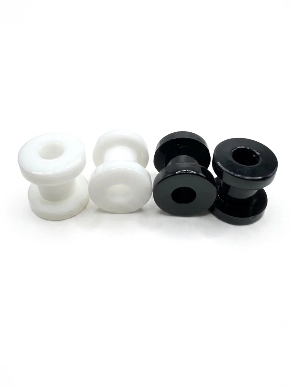 White and Black Double Flare Ear Tunnels — Pair